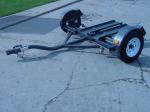 New Heavy Duty Tow Dolly with Hydraulic Surge Brakes, 14" Tires, Turntable, Ratchets and Tie-Down Straps