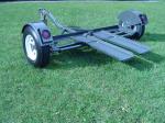 New Heavy Duty Tow Dolly with Hydraulic Surge Brakes, 14" Tires, Turntable, Ratchets and Tie-Down Straps