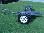 New Heavy Duty Tow Dolly with Hydraulic Surge Brakes, 14" Tires, Turntable, Ratchets and Tie-Down Straps