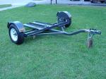 New Heavy Duty Tow Dolly with Hydraulic Surge Brakes, 14" Tires, Turntable, Ratchets and Tie-Down Straps